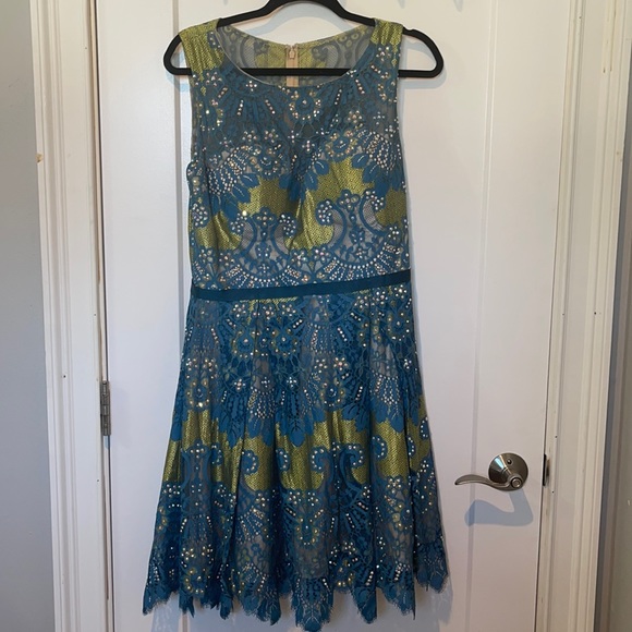 Beautiful Jovani peacock colored dress with embellishments. Worn once. - Picture 4 of 8